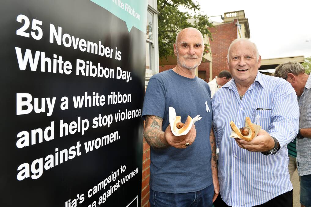 WHITE RIBBON: Hepburn Shire Council white ribbon ambassadors Jeff Stewart and Danny Moynighan say no to family violence. Picture: Dylan Burns