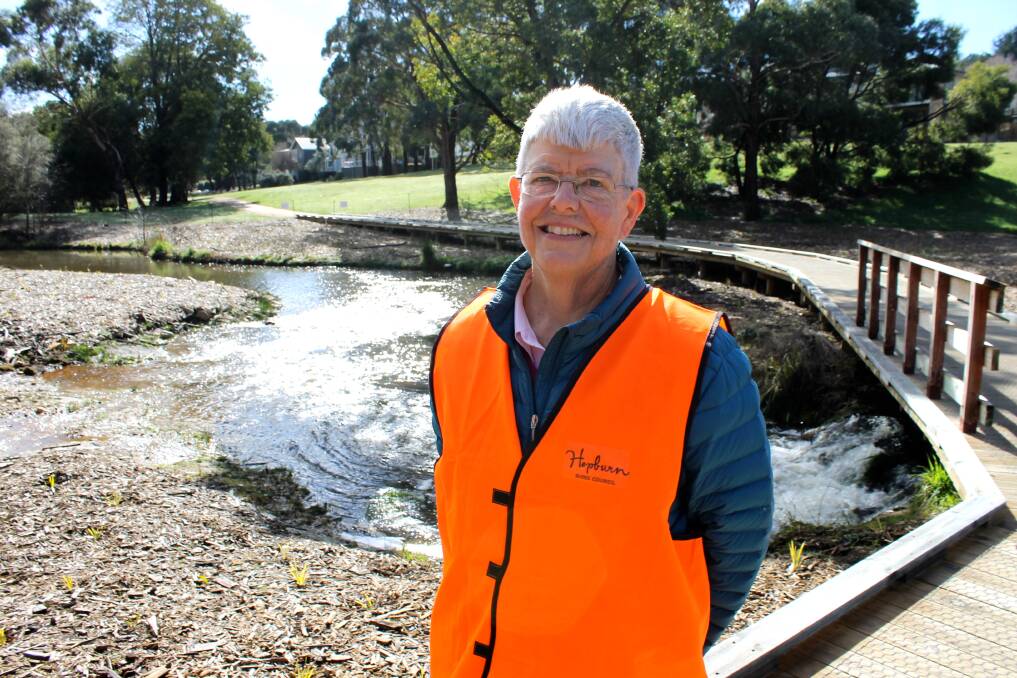 Daylesford resident Mary-Faeth Chenery stands on the new boardwalk at Lake Daylesford. New gravel paths and the boardwalk mean visitors can now walk the entire length of the lake. Picture: Rochelle Kirkham. 