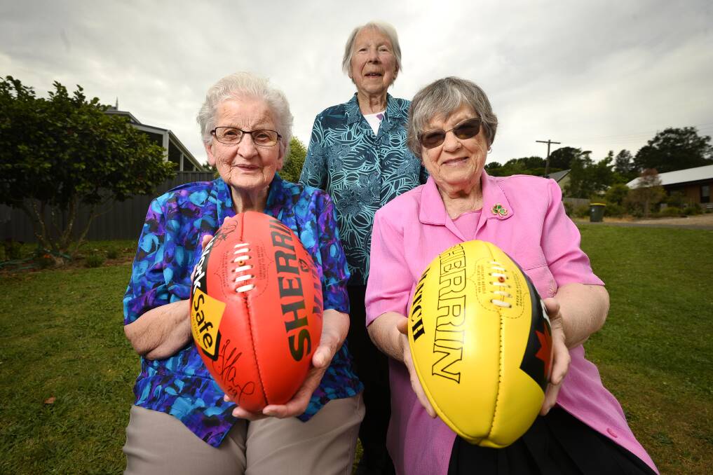 BEFORE THEIR TIME: June Powell, Irene Malone and Averil Winduss played football in a Daylesford all-women team in the 1940s. They will share their stories at a historical society meeting on Sunday. Picture: Dylan Burns