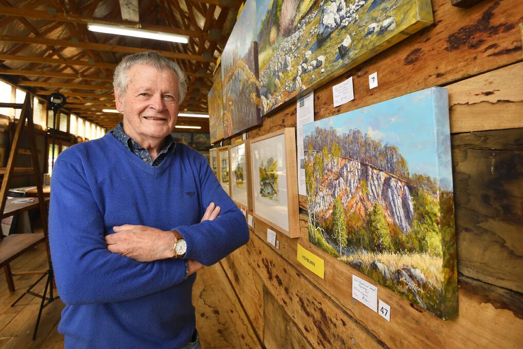 Brian Nash showcases his exhibition Villages of Hepburn. Picture: Dylan Burns. 
