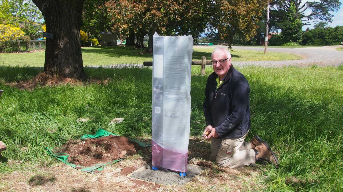 HONOURING SOLDIERS: Kingston Avenue of Honour chairman Ed Murphy unveils the new interpretive sign which will help visitors locate trees. Picture: Julie Lindsay 