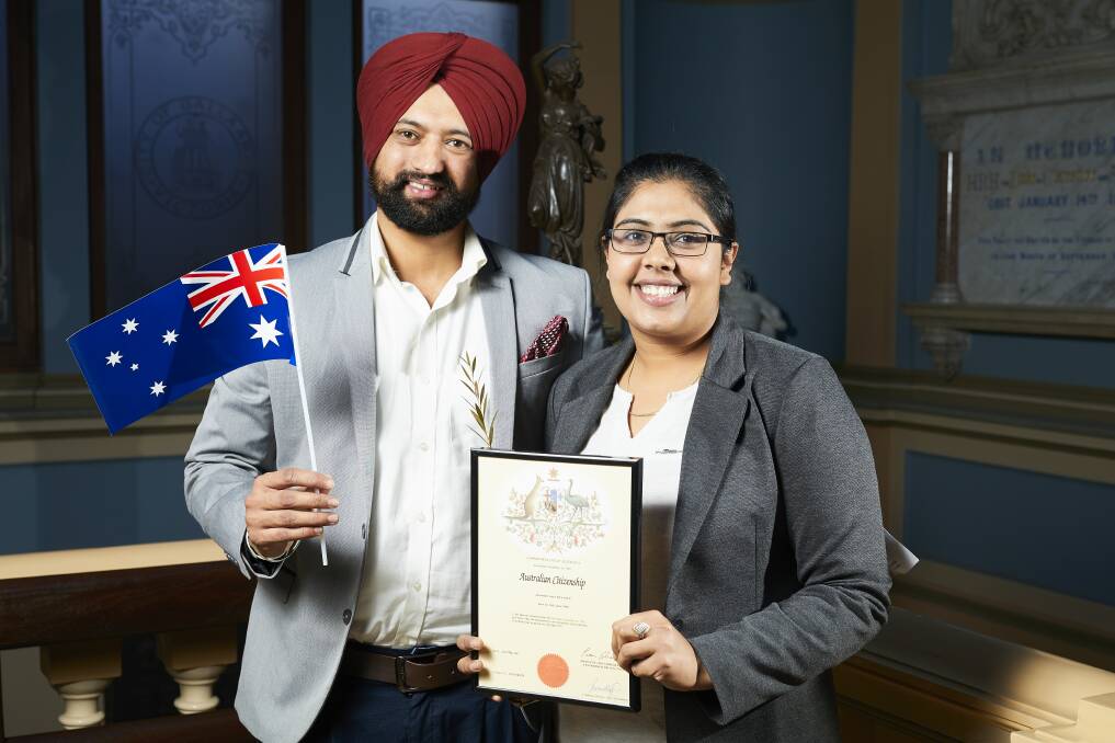 Pardeep Singh and Jaswinder Kaur Bhandol at a citizenship ceremony at Ballarat Town Hall in 2017. Picture: Luka Kauzlaric