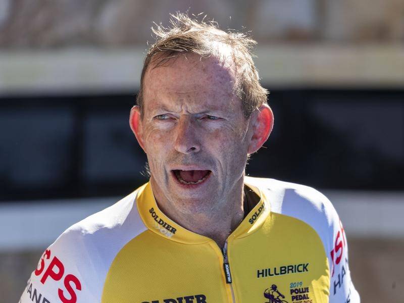 Former prime minister Tony Abbott and fellow Pollie Pedal riders have ended their ride in Brisbane.