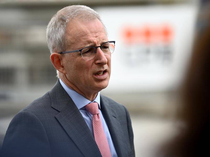 Paul Fletcher is defending a commuter car park scheme after a scathing auditor-general's report.