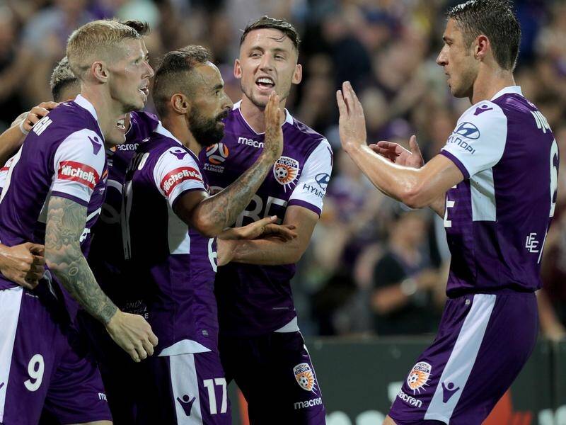 Perth Glory have gone nine points clear at the top of the A-League after beating Brisbane 4-0.
