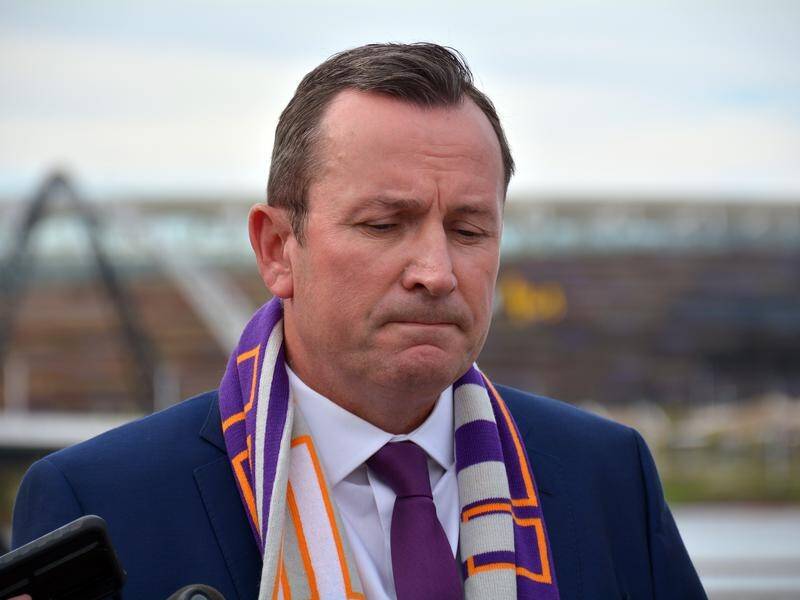 WA Premier Mark McGowan is accused of 'crab-walking' away from Labor's federal defeat.