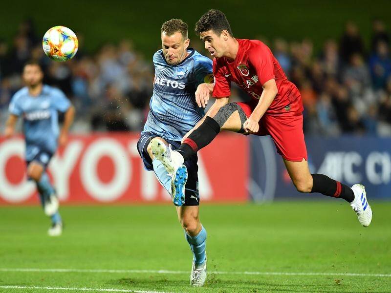 Sydney's Alex Wilkinson (L) believes his side won't be fatigued for their upcoming A-League derby.
