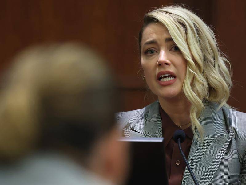 Amber Heard has told a court she just wants Johnny Depp to "leave me alone".