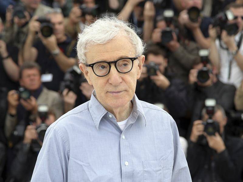 Woody Allen says Amazon Studios abandoned a movie production and distribution deal without cause.