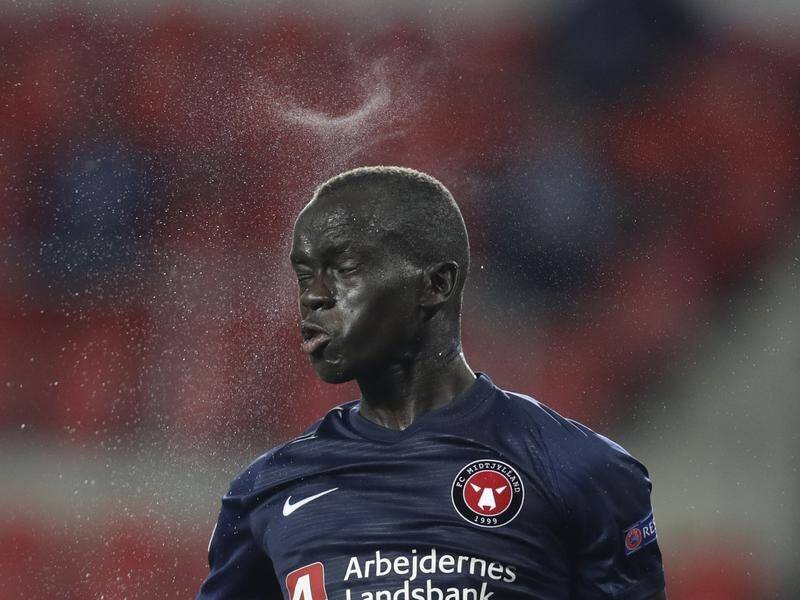 Socceroos winger Awer Mabil has helped Danish side FC Midtjylland qualify for the Champions League.