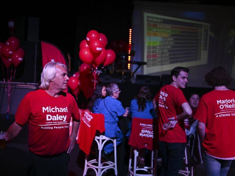 NSW Labor party members watch the election results at Selina's on Saturday night.