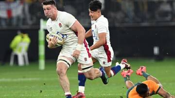 England's Tom Curry (l) will miss the rest of the Test series with the Wallabies due to concussion.