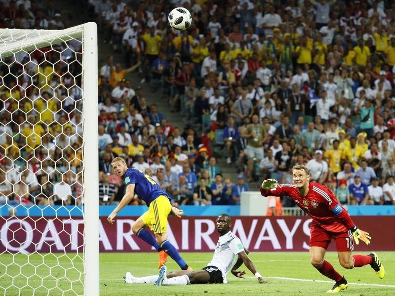 New Melbourne Victory striker Ola Toinoven scores for Sweden against Germany in the World Cup.
