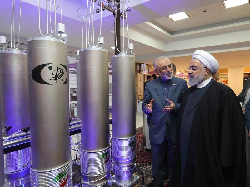 President Hassan Rouhani (R) has laid out the conditions under which Iran will talk to the US.