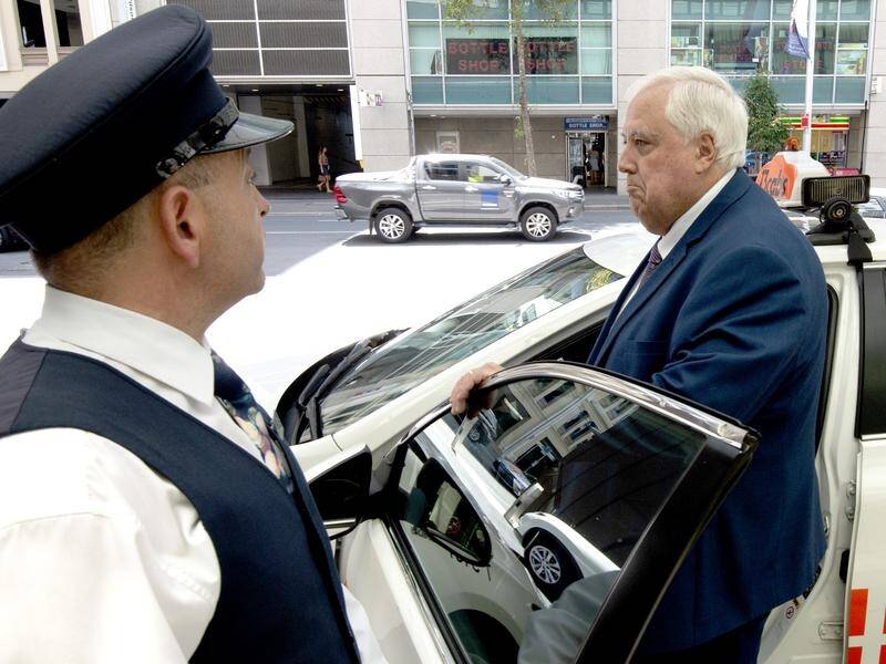 Clive Palmer has been fined for failing to give way and causing a crash in Brisbane.