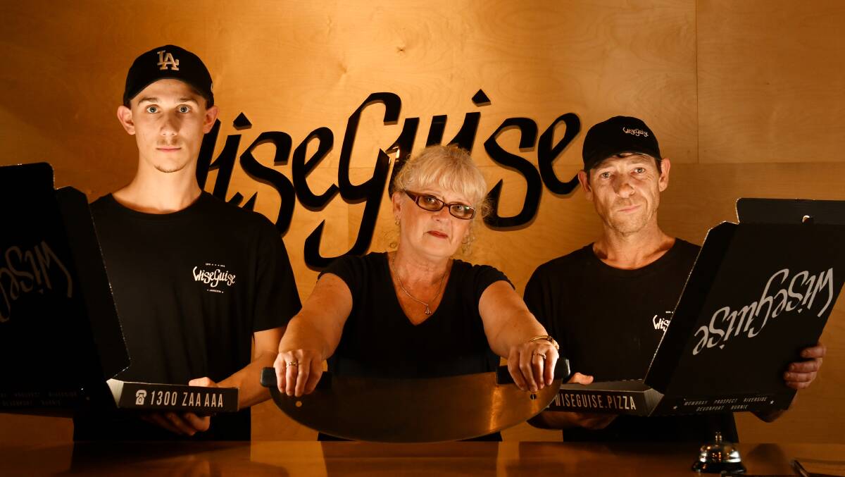 CHEESED OFF: WiseGuise Burnie assistant manager Jordan Butt, Mamma Rosas owner Sandra Blacklow and WiseGuise Burnie manager Andy Bartlett were annoyed by the fake orders. Picture: Brodie Weeding