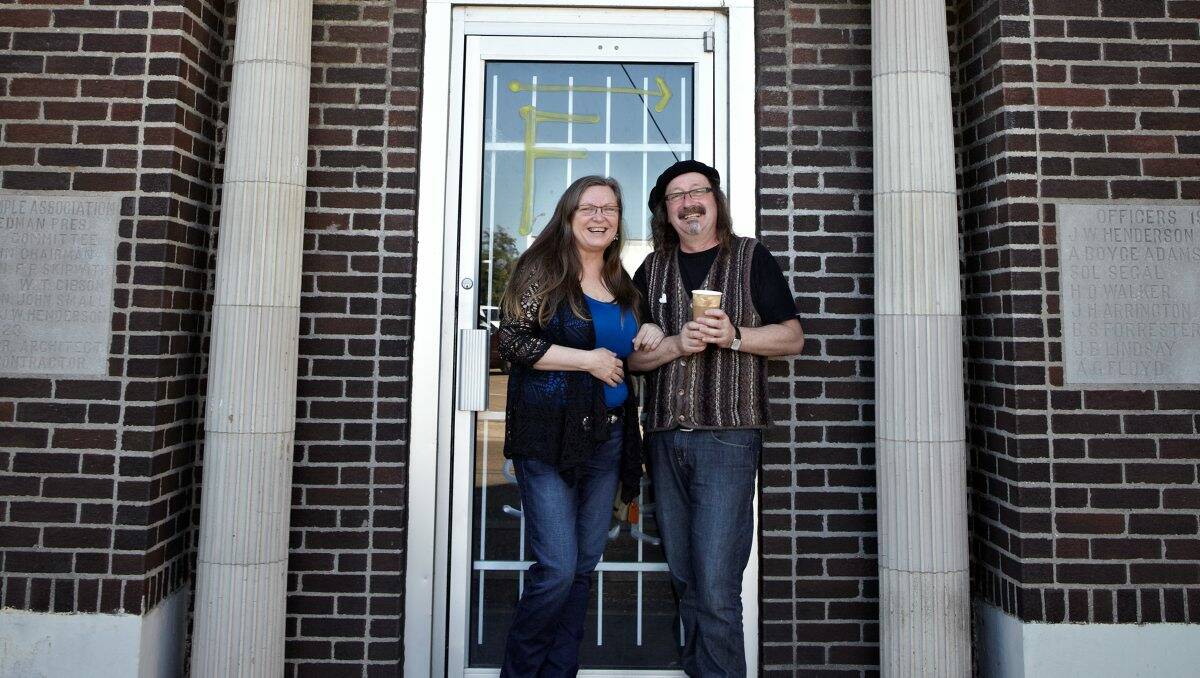 POTENTIAL: Carla Maxwell and partner Adrian Kosky outside the Masonic temple in Clarksdale, Mississippi, they have purchased and are about to revitalise. Picture: CONTRIBUTED